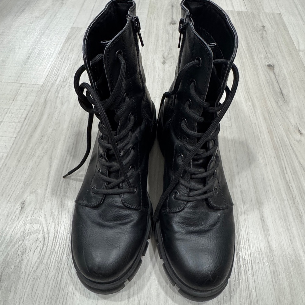 Black High-Top Combat Boots with Sturdy Rubber Soles
